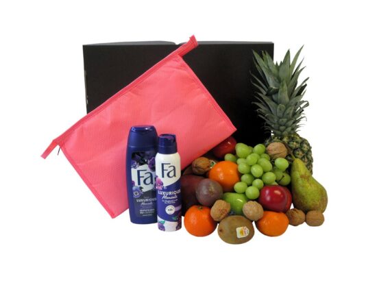 Fruitmand Health & Care Vrouw met verse ananas, kiwi, luxe toilettas en verzorgingsproducten - Hippefruitmand.nl